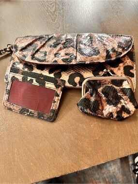 Unique Leopard Print clutch has mirror and comes with coin purse and card holder